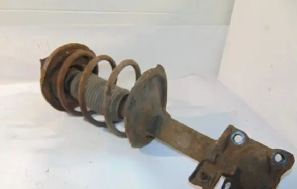 Nissan Almera Tino Front shock absorber with coil spring 54303BU111 54010BU300