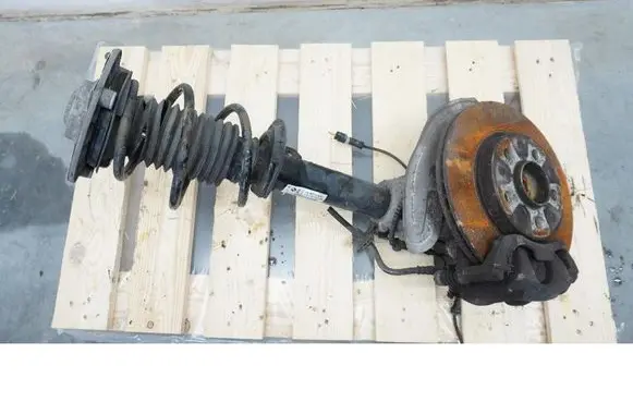 Front wheel hub spindle knuckle