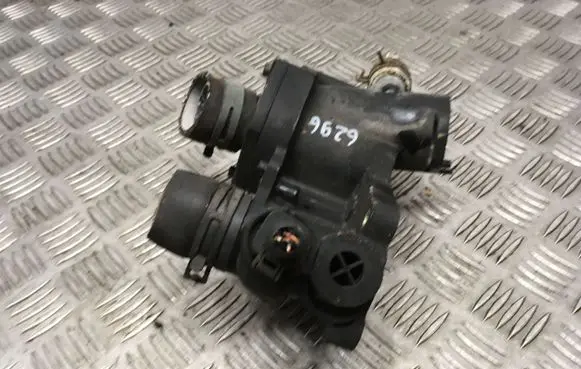 Thermostat/thermostat housing