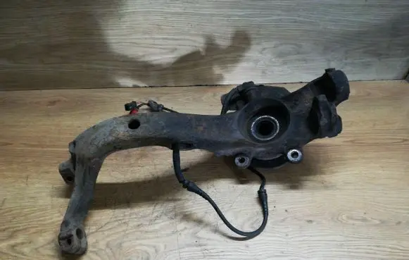 Volkswagen PASSAT B5 Front wheel hub spindle knuckle 8D0407257