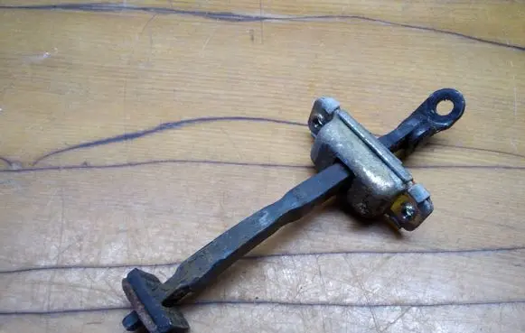 KIA Sportage Rear door check strap stopper