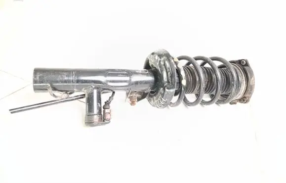 Volkswagen PASSAT CC Front shock absorber with coil spring 1T0412103A