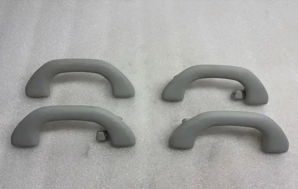 Volkswagen PASSAT B6 A set of handles for the ceiling 1K0857607J
