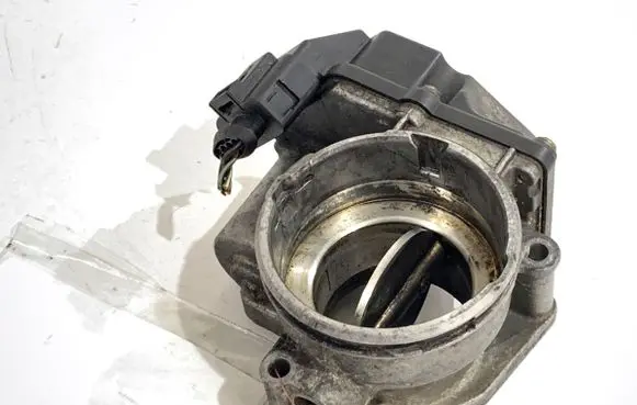 Volkswagen PASSAT B6 Engine shut-off valve 03G128063A