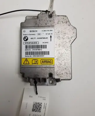 BMW X5 E70 Airbag control unit/module 6577915979501 657791597501 0285010094