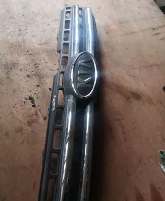 KIA Sportage Front bumper upper radiator grill 863501F030