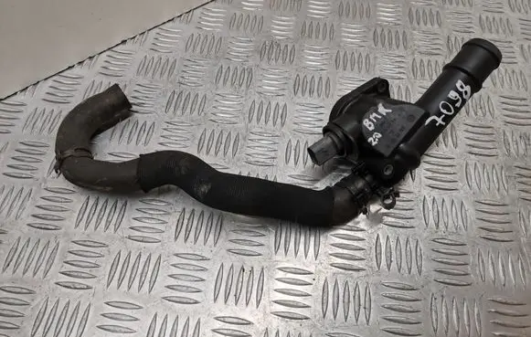 Volkswagen PASSAT B6 Engine coolant pipe/hose 03G121132B