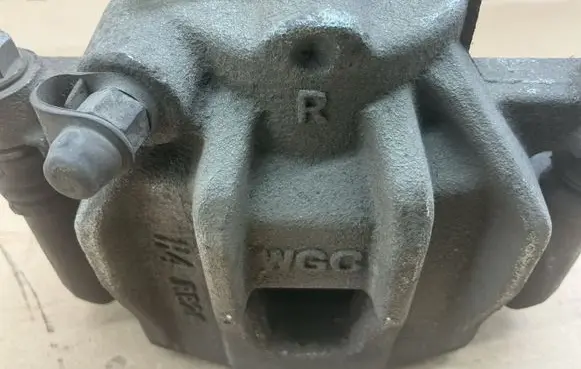 Dacia Spring Front brake caliper