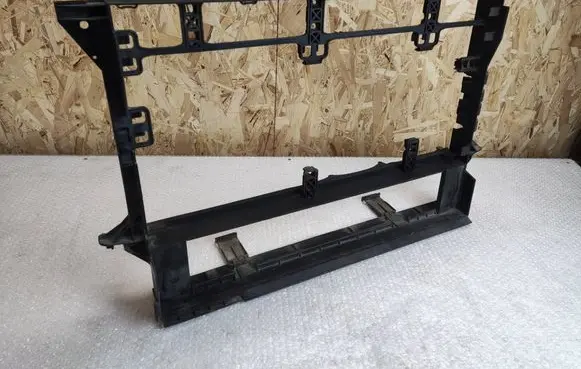 Radiator support slam panel