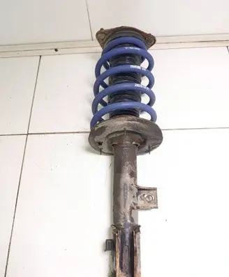 KIA Sportage Front shock absorber with coil spring 546603U000