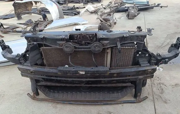 Radiator support slam panel