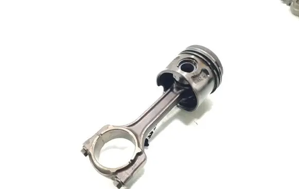 Opel Astra H Piston with connecting rod 
