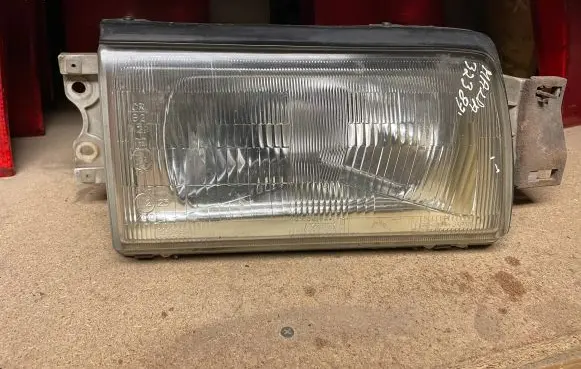 Mazda 323 Headlight/headlamp 11061194R 11061191