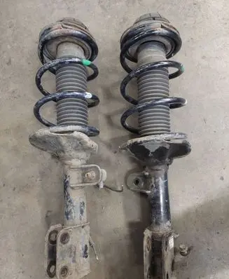 Nissan Pixo Front shock absorber with coil spring