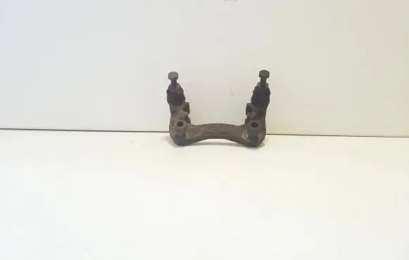 Volkswagen PASSAT B5 Brake caliper pad carrier rear 