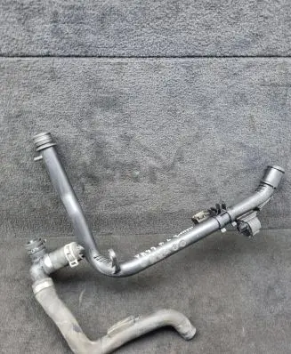Volkswagen PASSAT B7 Engine coolant pipe/hose 03L121065AJ
