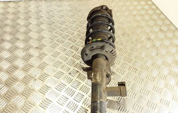 Volkswagen PASSAT B7 Front shock absorber with coil spring