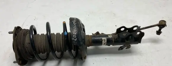 Toyota Corolla E210 E21 Front shock absorber with coil spring