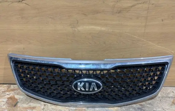 KIA Sportage Front bumper upper radiator grill 863523U500