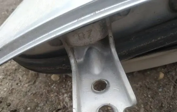 Subaru Legacy Rear door lower hinge