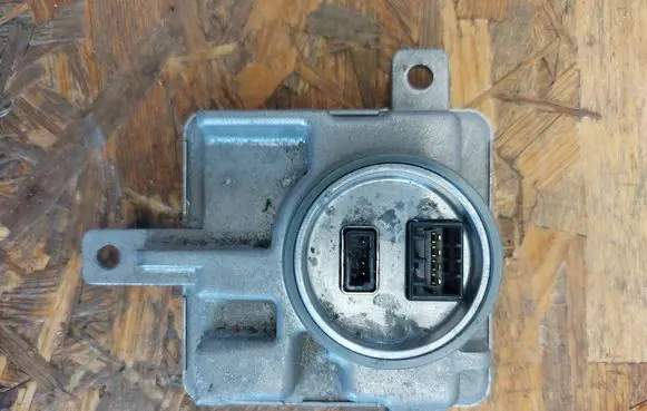 Volkswagen Golf VII Headlight ballast module Xenon 8K0941597E