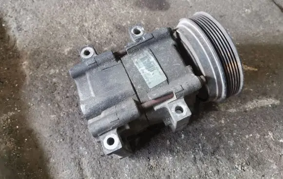 Ford Puma Air conditioning (A/C) compressor (pump) 97FW19D629AA