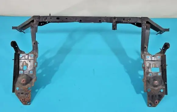 Radiator support slam panel