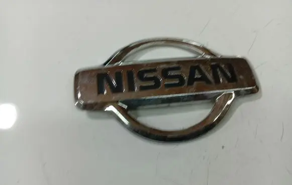 Nissan Almera Tino Manufacturer badge logo/emblem 84890BU300