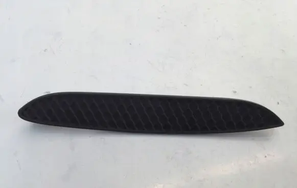 Rear bumper trim bar molding