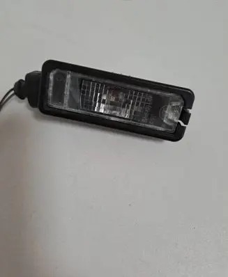 Volkswagen Polo V 6R Number plate light 1K8943021