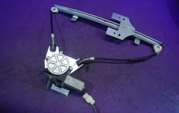 Volkswagen Fox Front door window regulator with motor
