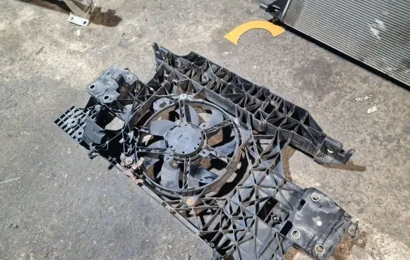 Radiator support slam panel