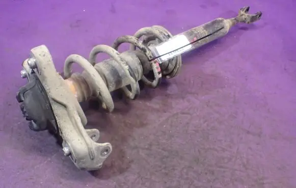 Front shock absorber with coil spring