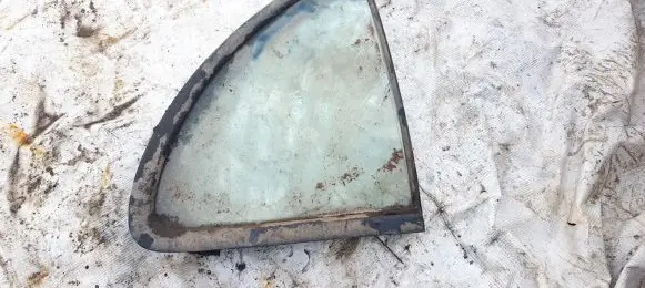 Nissan Almera Rear vent window glass 