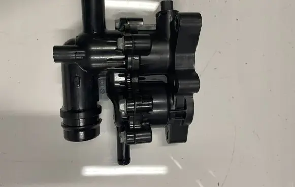 Thermostat/thermostat housing
