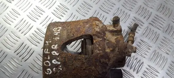 Volkswagen Golf IV Front brake caliper