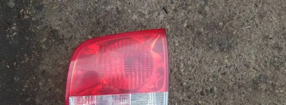 Volkswagen Touareg I Tailgate rear/tail lights 7L6945094H