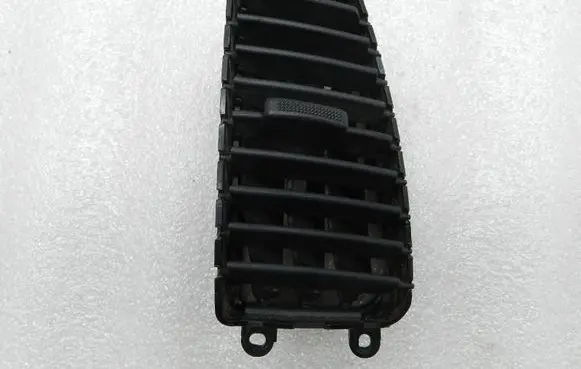 KIA Sorento Dash center air vent grill 974303E000