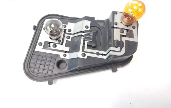 Volkswagen Touareg I Tail light bulb cover holder 7L6945258