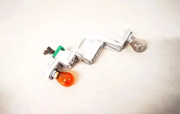 Volvo V50 Tail light bulb cover holder 28127002