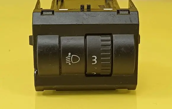 Headlight level height control switch