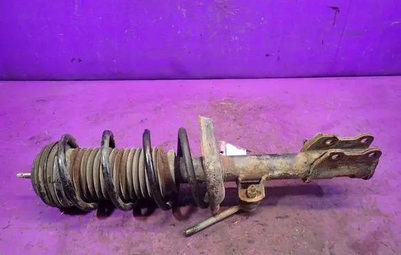 Opel Corsa D Front shock absorber with coil spring 13214358
