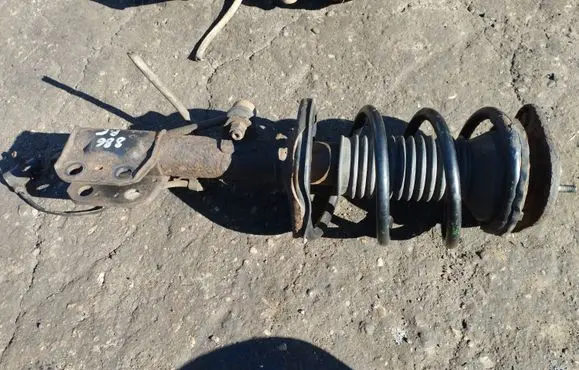 Toyota Corolla Verso AR10 Front shock absorber with coil spring