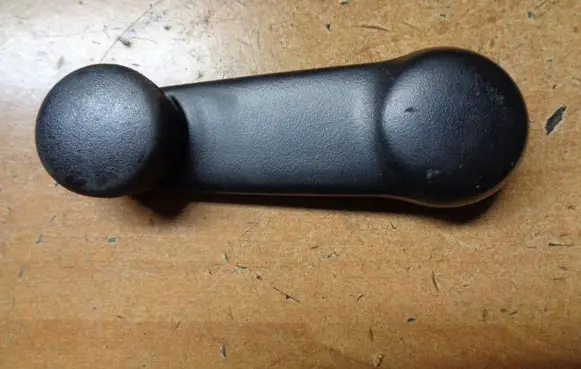Nissan Note (E12) Rear door window winding handle 