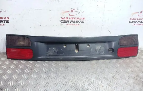 Renault Laguna I Trunk door license plate light bar 7701038277