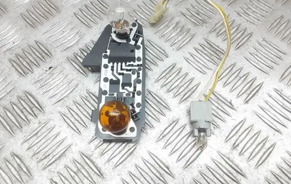 Toyota Yaris Tail light bulb cover holder