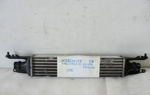 Opel Corsa D Intercooler radiator 55702194