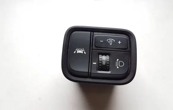 Headlight level height control switch