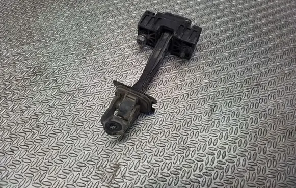 Front door check strap stopper
