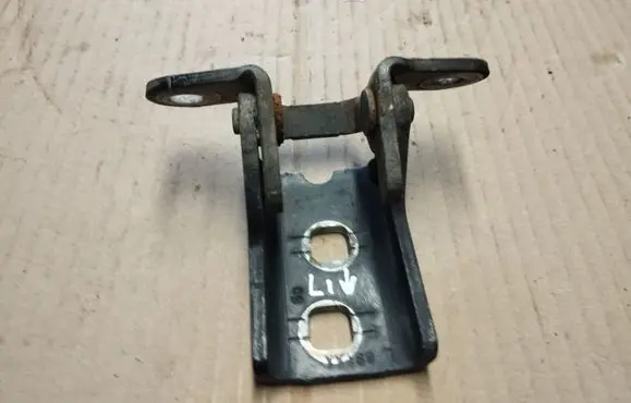 Front door lower hinge
